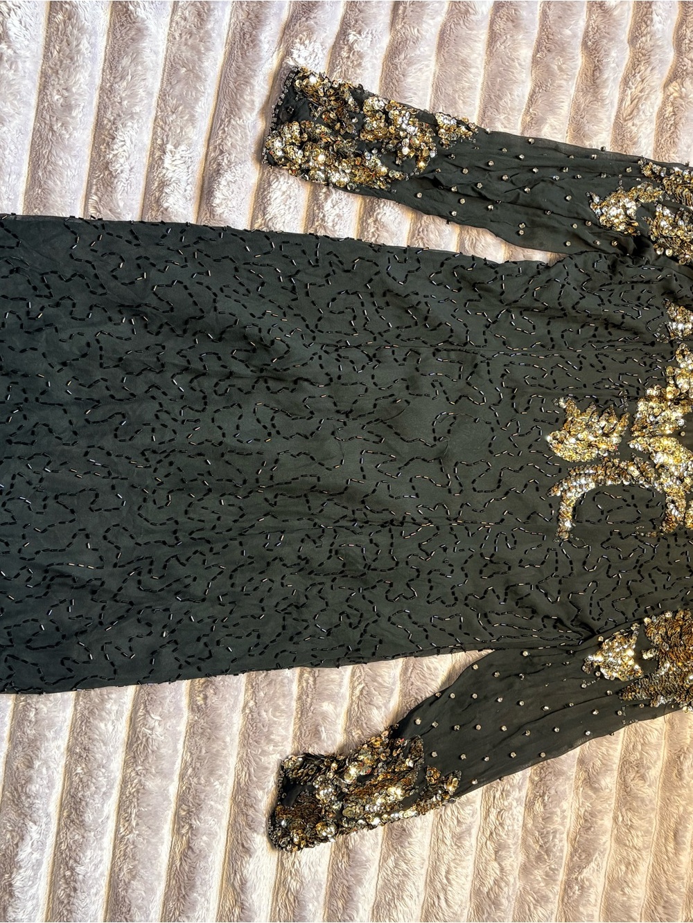 Elegant Black Dress with Gold Sequin Accents